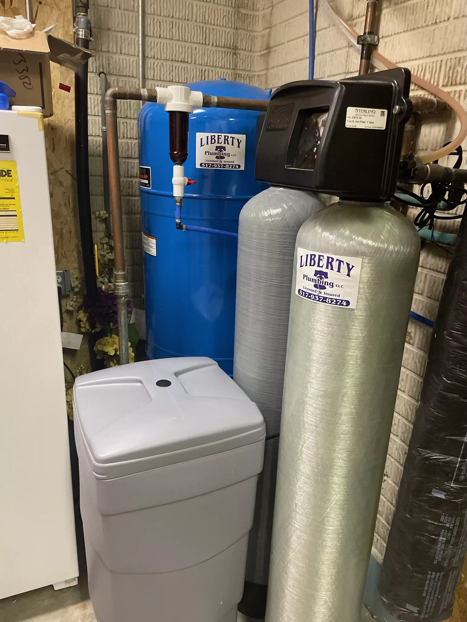 Liberty Plumbing water softener, iron trap, 86 gallon well tank and blow down filter